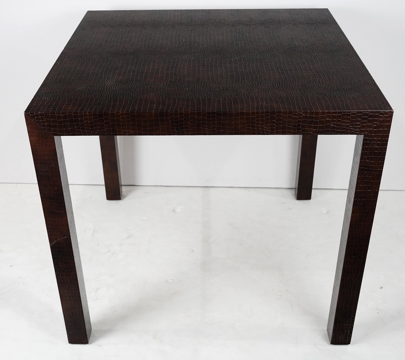 An Aldo Tura style games table (1 of 3)