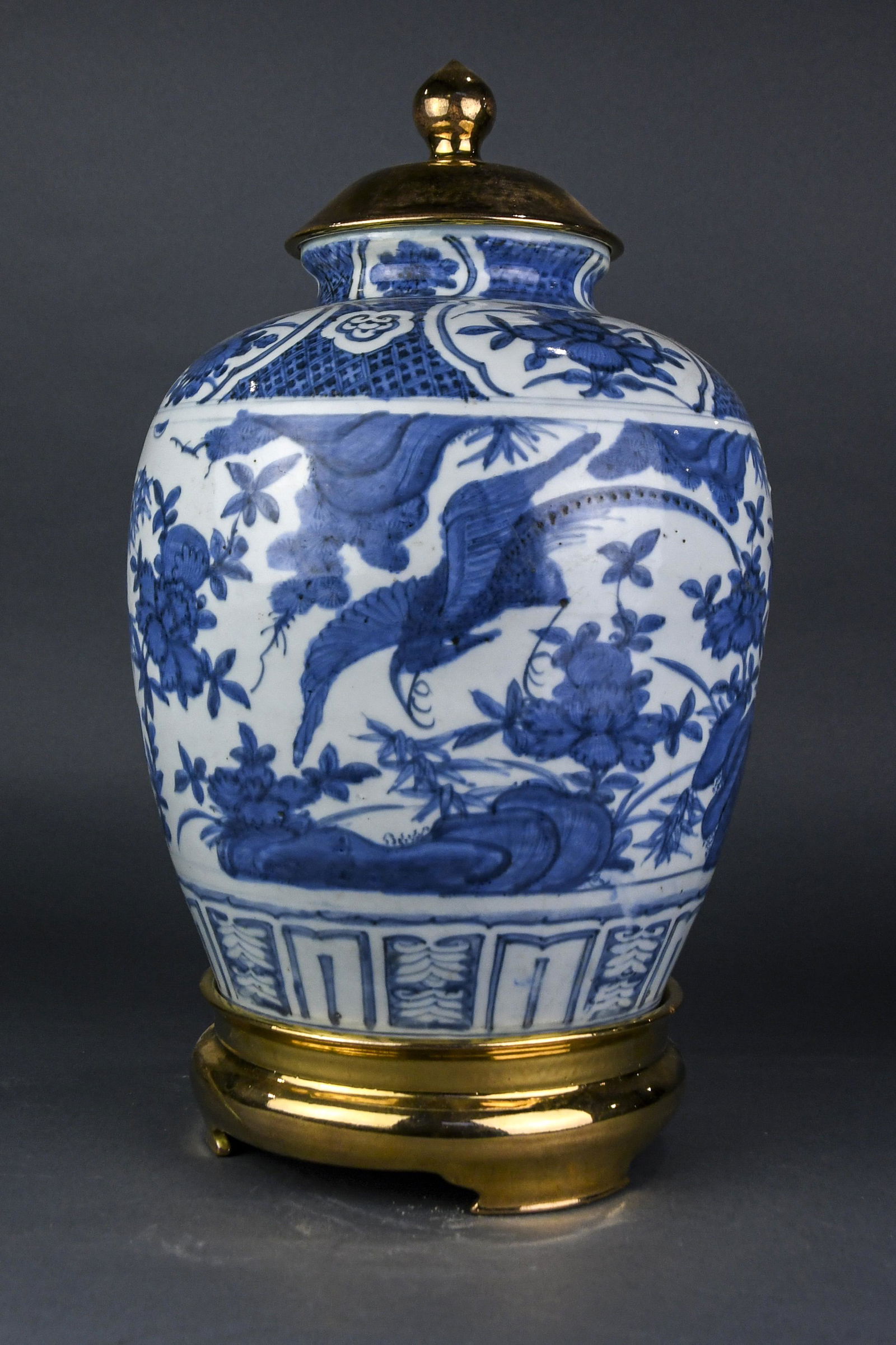 A Chinese Ming style blue and white jar with brass lid (1 of 2)