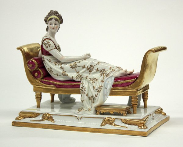 Painted porcelain figure ''Madame Recamier'': Polychrome painted porcelain figurine, ''Madame Recamier'', after the painting of the French beauty by Jacques Louis David, marked on reverse with S intersected by a pair of diagonally crossing lines,