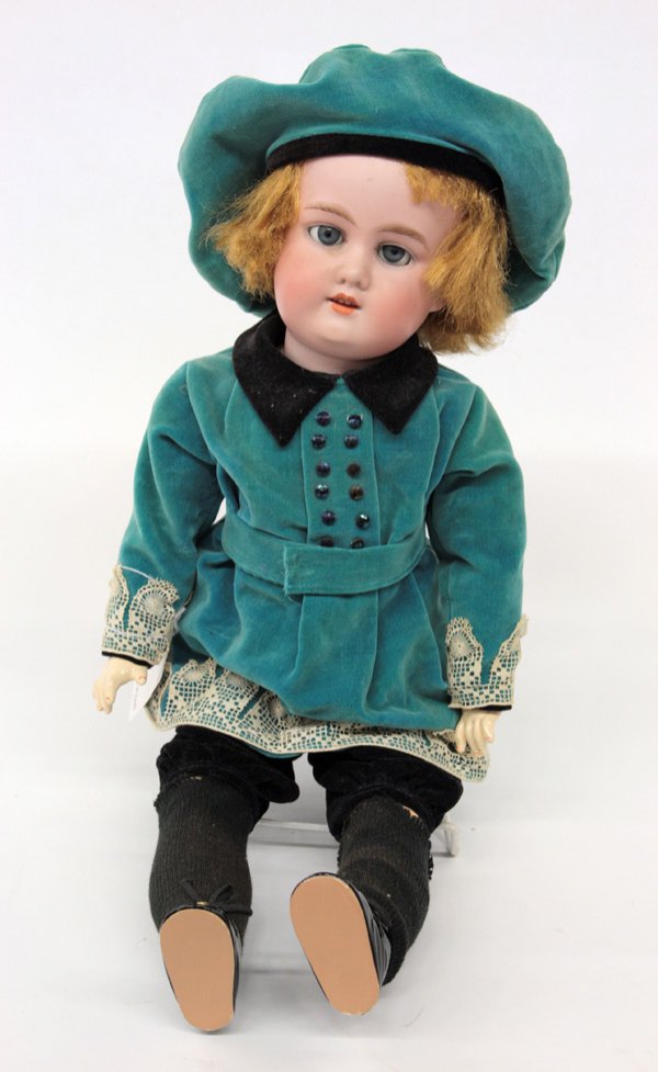 Armand Marseille ''Florodora'' bisque doll: Antique Armand Marseille ''Florodora'' bisque socket head doll with hand painted facial features set with blue sleep eyes and four teeth showing, on a ball jointed composition body appropriately dress
