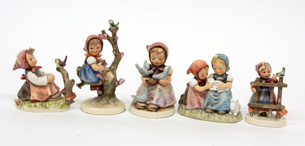 5) Hummel figurines: (lot of 5) Hummel figurines "Signs of Spring" 4th mark, 4"; "In Tune" 6th mark,4.25"; "Apple Tree Girl" 6th mark, 6"; "Cinderella" 5th mark, 4.25"; "Easter Time" 6th mark, 4"