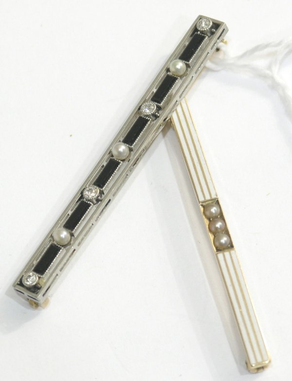 Two bar pins; one mounted in platinum: Two bar pins; one mounted in platinum and yellow gold, set with black onyx and diamond accents and one mounted in 14k yellow gold, set with half pearl accents. Total bar pins weight approximately 8.9 