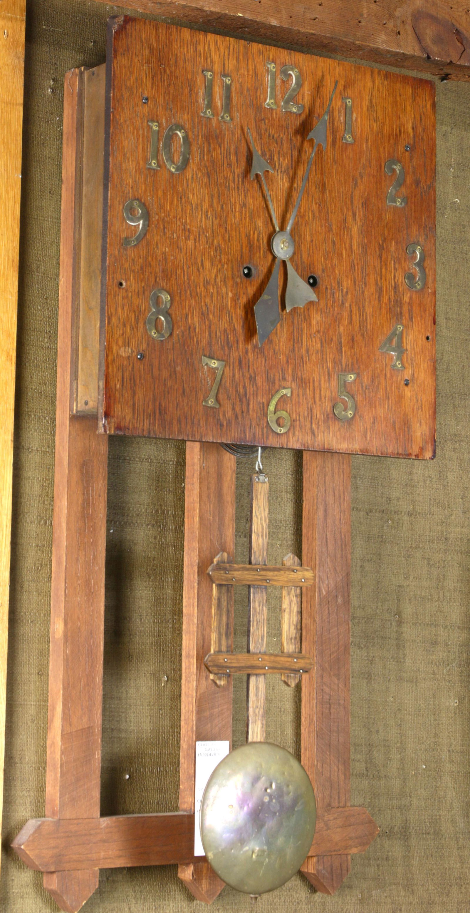 An American Arts and Crafts oak wall clock (1 of 1)