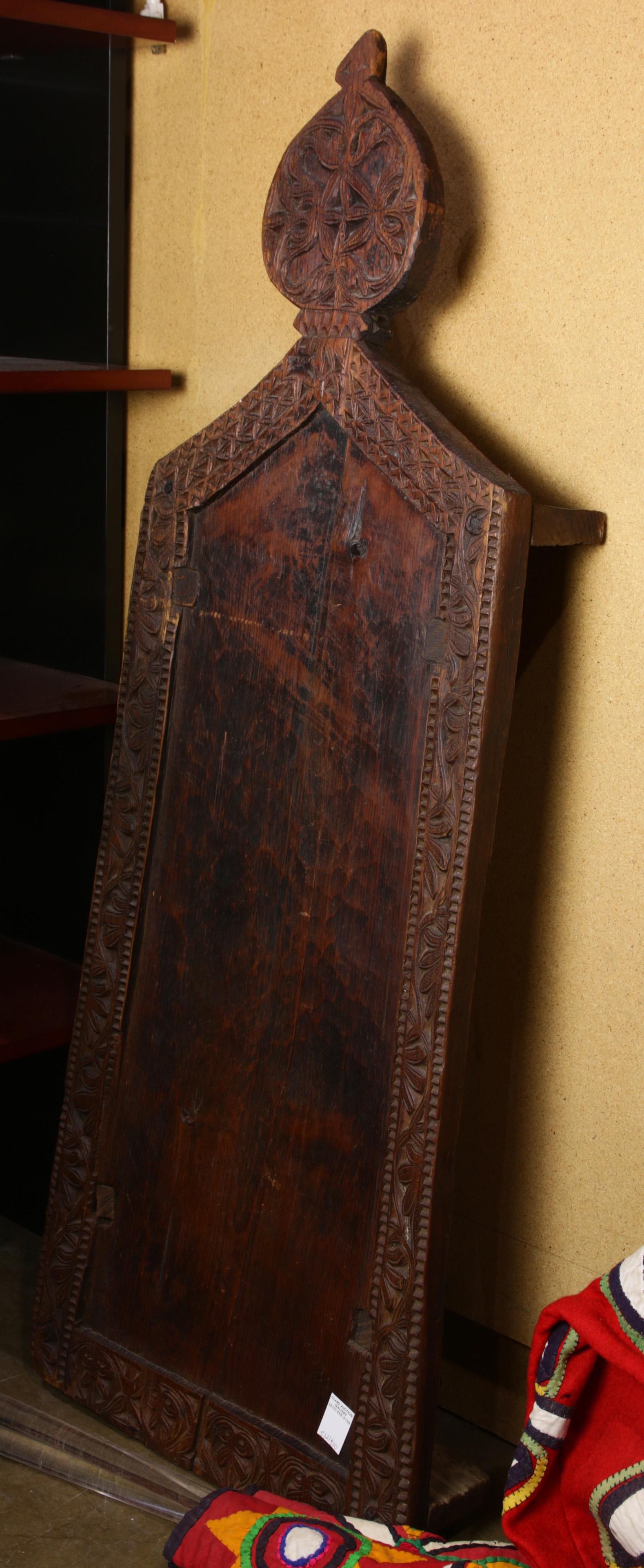 Pakistani Swat Valley prayer bed: Pakistani Swat Valley prayer bed carved in form of mihrab, 5.5"h x 53.5"w x 17.5"d