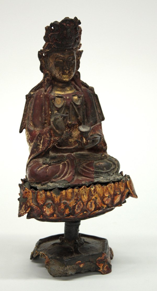 Chinese Gilt Metal Buddhist Figure: Chinese gilt metal figure of Guanyin, Ming/Qing dynasty, the princely bodhisattva seated in meditation with one hand raised, the other holding a small vessel(?), the crisply cast facial features frame