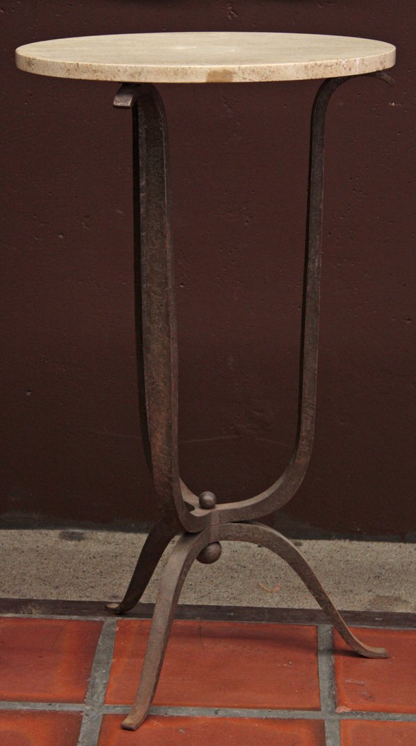 Round side table with travertine top: Round side table with travertine top on wrought iron tripod base, 34''h x 20''d