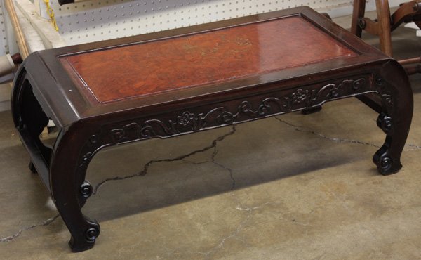 Chinese Wood Low Table: Chinese low wood table, the floating rectangular top with traces of pigment and gilt decorations, with clouds and bats carved in low relief across the apron which scrolls down forming continuous side 