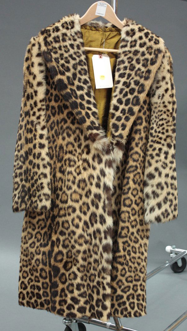 4240: Vintage leopard fur coat