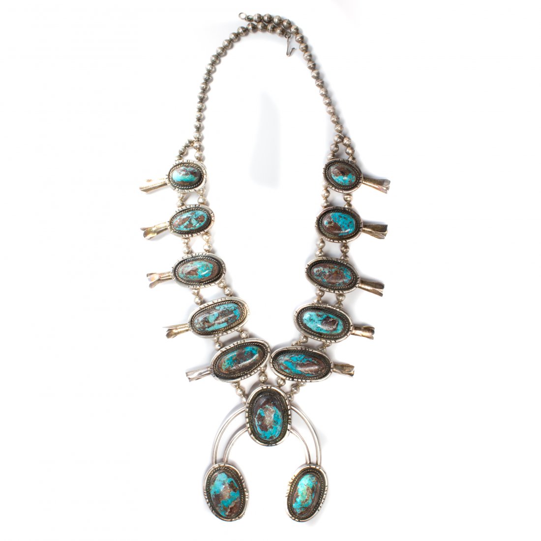 A turquoise and silver squash blossom necklace (1 of 1)