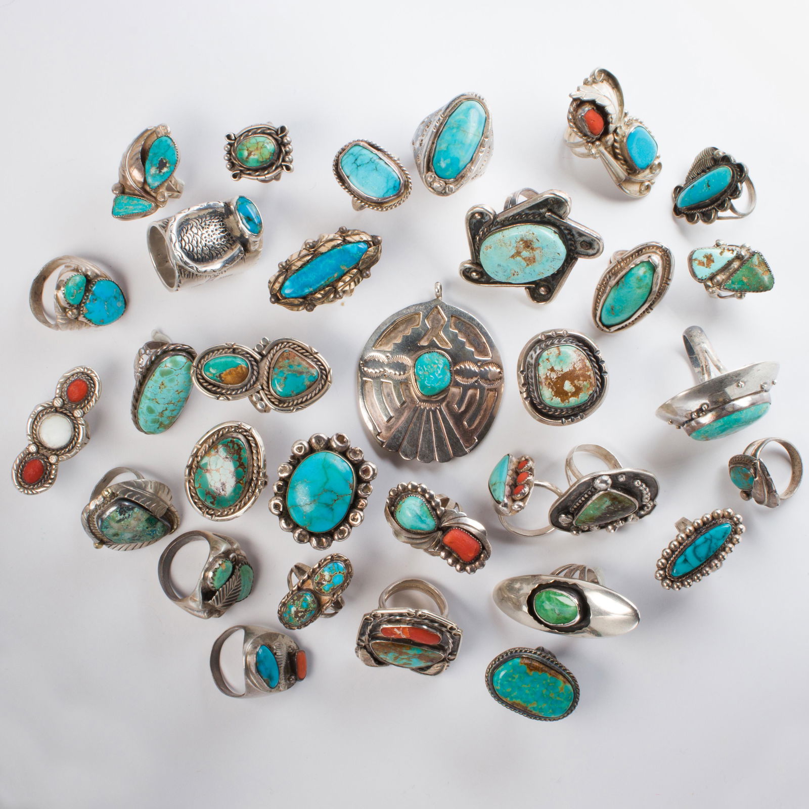 A group of turquoise or coral and silver jewelry (1 of 1)
