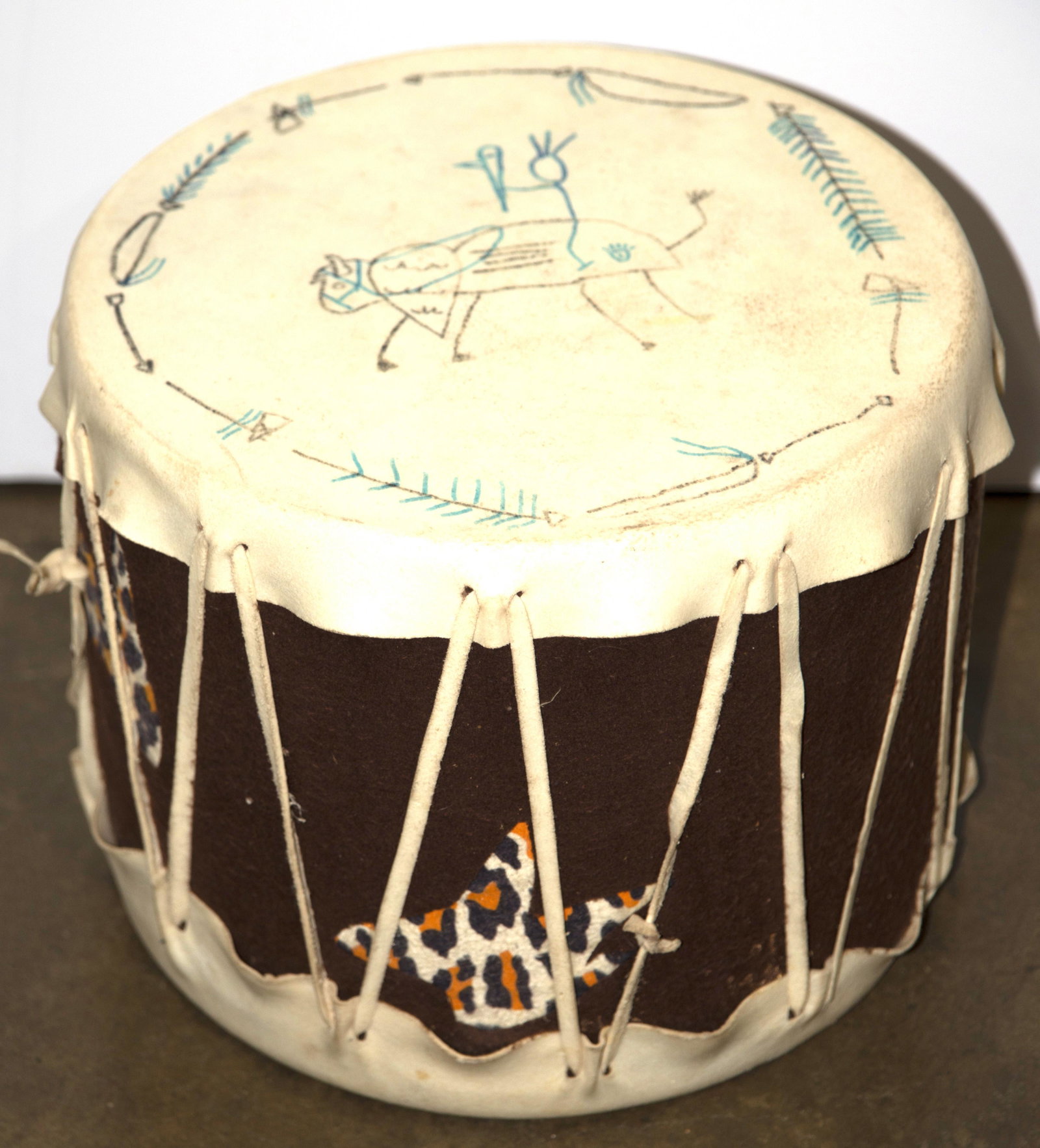 A hide drum: A hide drum, 10"h x 12.5"dia.