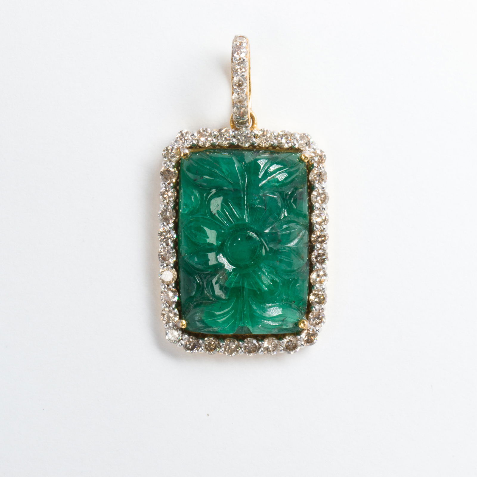 An emerald, diamond and eighteen karat gold pendant (1 of 1)
