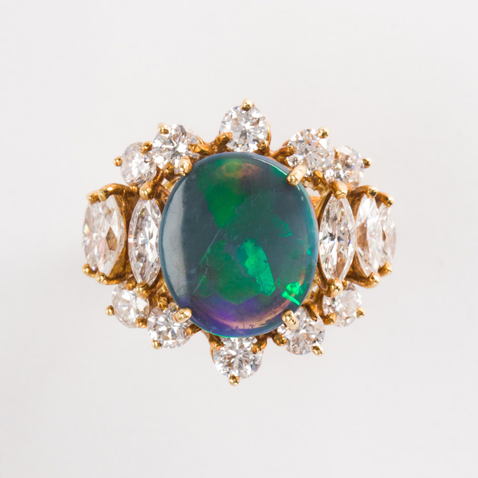 A black opal, diamond and eighteen karat gold ring (1 of 2)
