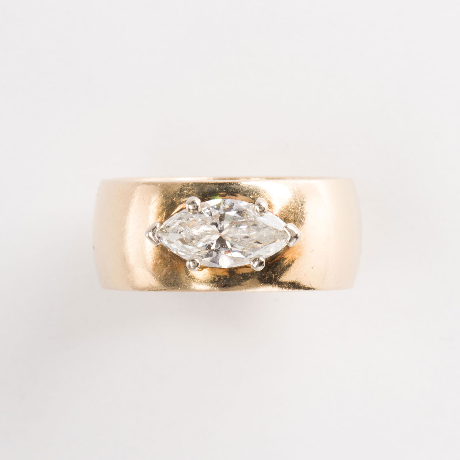 A diamond and fourteen karat gold ring (1 of 1)