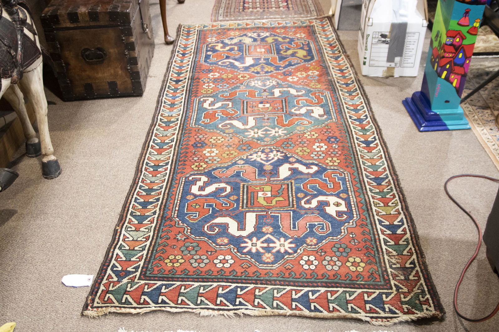 An antique Caucasian Kazak runner (1 of 4)
