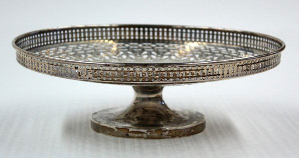 Meriden Brittania sterling pastry stand: Meriden Brittania (Connecticut, 1895-1898) sterling silver pierced and footed pastry stand having ornate patterning throughout, upon a circular pedestal base, 10.5''d, 13 troy oz.