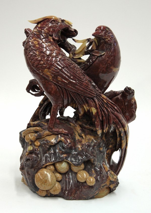 Chinese large soapstone pheasant group: Chinese large soapstone pheasant group, expertly carved and undercut as a pair of pheasants on a rocky outcropping scattered with mushrooms and foliage picked out of the variously colored inclusions o
