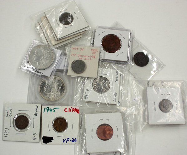 Coins in plastic holders: Grouping of approximately 12 coins in plastic holders including an AC 1808 half cent and 2 common silver dollars