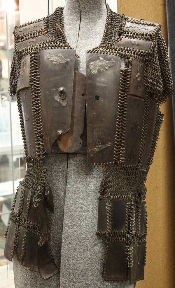 Philipine Chainmail Armor, Moro: Southeast Asian chainmail armor, Philipines, Moro, 19th century, in the form of a shirt consisting of water buffalo horn plates with remnants of brass applique and linked together by chain maille (for