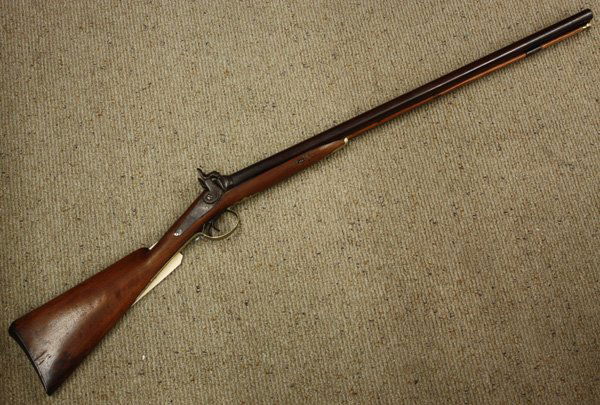 Old English double barrel percussion cap shot gun: Old English double barrel percussion cap shot gun, circa 1830, 46''l overall