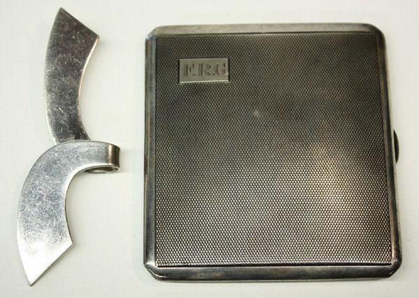 Sterling silver brooch card case: (lot of 2) Sterling silver personal articles including a Mexican ribbon form brooch, and a Mappin & Webb, Birmingham, 1931 lady's card case with vermeil interior, monogrammed 'FRG', 3 troy oz.