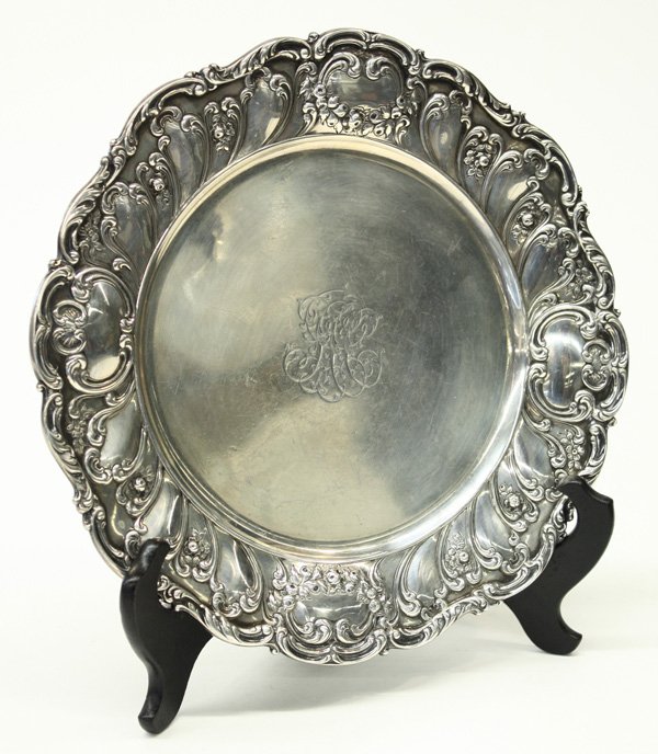 Gorham sterling silver circular tray: Gorham sterling silver circular tray having scalloped rim, acanthus leaf and floral repousse border, date mark corresponding to 1899, monogrammed indistinctly, 10''h, 20 troy oz.