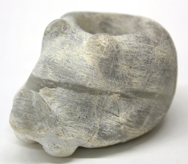 Central American mouble mace head: Central American marble mace head with 200 morphic features, 3''l x 3.75''h. Denver Art Museum Deaccession.