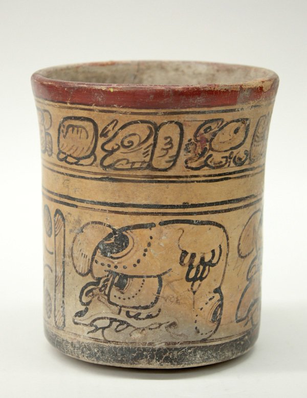Mayan Copador cylinder jar: Mayan Copador cylinder jar with Honduras/El Salvador Glyphs and trophy heads around (hairline cracks) 5.5''h x 4.5'' diam. Denver Art Museum Deaccession.