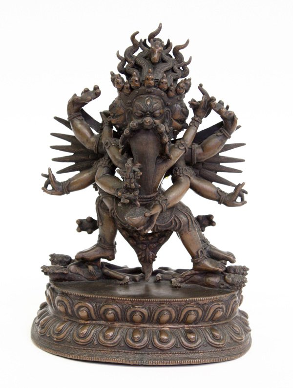 Himalayan Patinated Bronze Hayagriva Figural Grou: Himalayan bronze Buddhist figural group, featuring Hayagriva and his consort in yab-yum on a double lotus pedestal, the three-headed dharmapala with six arms and four legs and in physical congress wit