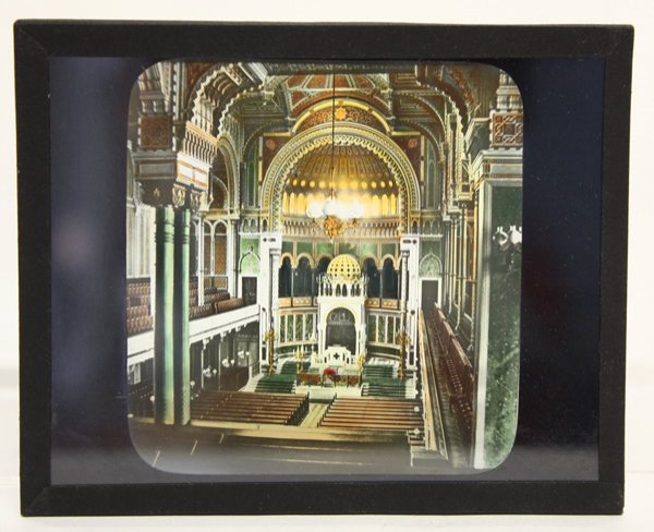 Colorized glass sildes: (lot of 15) Colorized glass sildes contained in 2 boxes, late 19th to early 20th century, 5 Rembrandt paintings with labels ''C.T. Milligan Philadelphia'', together with 10 European scenes, mostly Ger