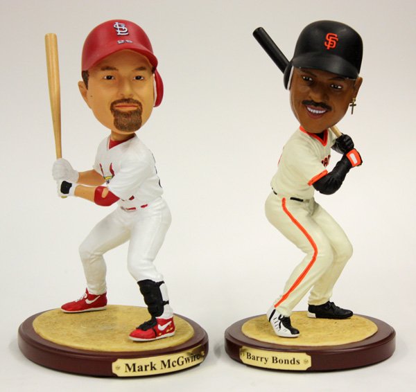 Sports Memorabilia: Shelf lot containing 23 bobble head figurines of various baseball and basket ball players, including Barry Bonds, D. Christie, Robb Nen and others