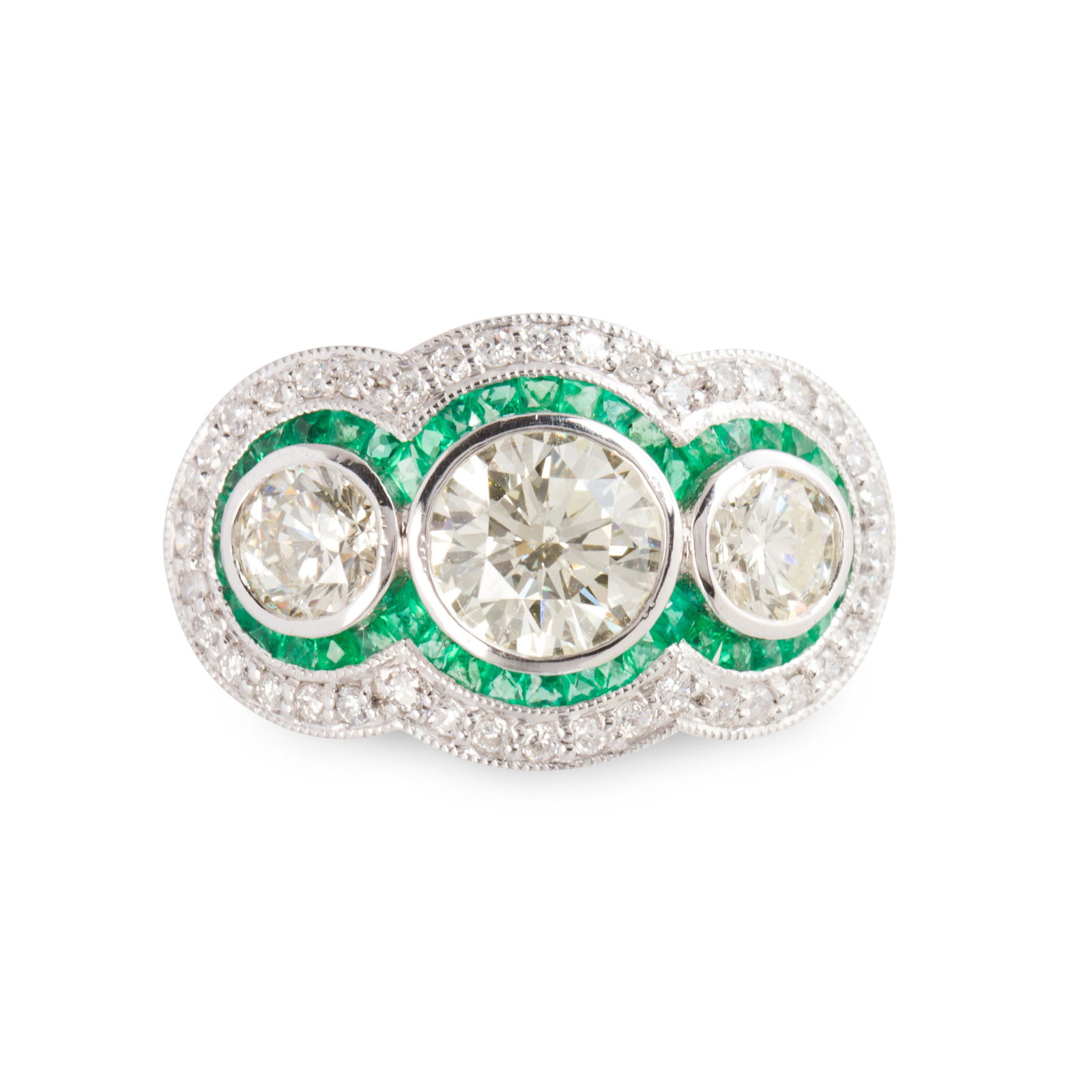 A diamond, emerald and platinum ring (1 of 2)