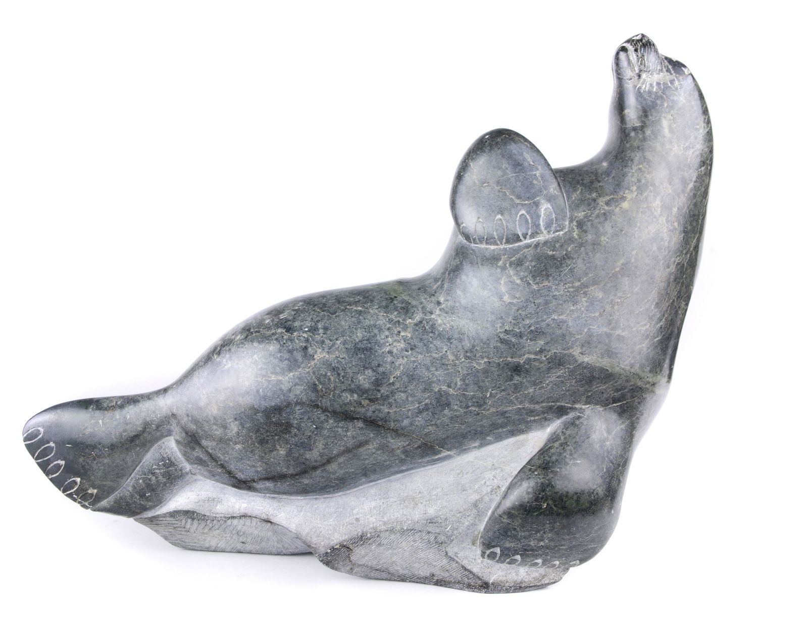 An Inuit figural sculpture by Kuk (1 of 6)