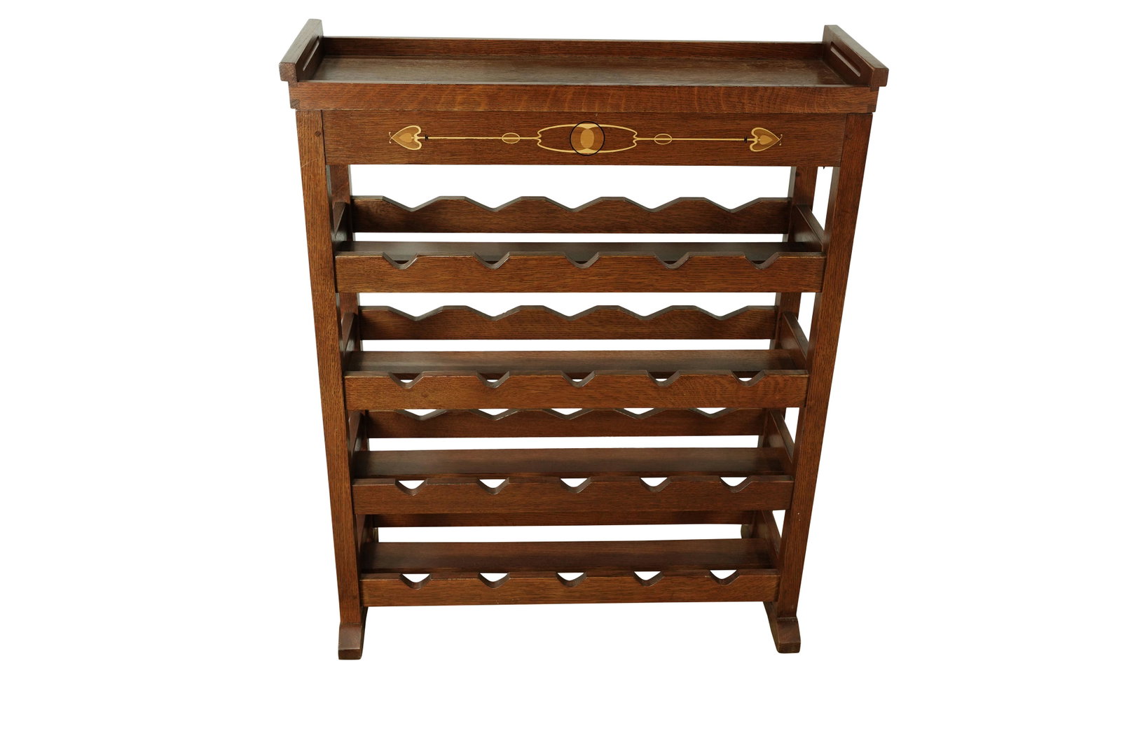 A Stickley Collectors Edition wine rack: A Stickley Collectors Edition wine rack, each of the four open shelves accomodating five wine bottles, the top functioning as a removable serving tray opening to a compartment with Stickley charcuteri