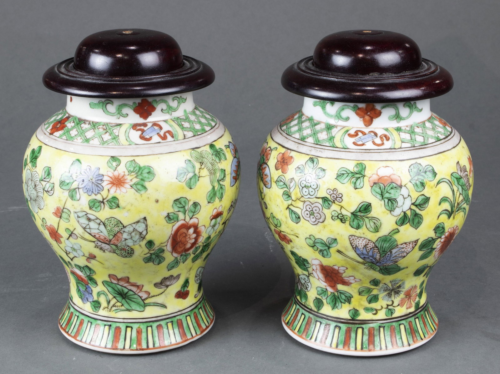 Pair of famille verte jars with later wood covers,: Pair of famille jaune jars with later wood covers. 6"h.