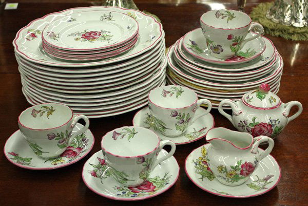 Copeland Spode Luneville dinner service: (lot of 39) Copeland Spode Luneville dinner service having hand painted polychrome floral decorations against a white ground, with pink banding to scalloped edges, comprising 13 service plates, 7 sala