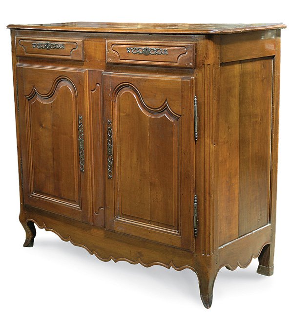 Louis XV style oak buffet: Louis XV style cherry buffet, first quarter 19th century, having molded cornice, shaped, panelled drawers and double doors, fluted sides and pierced escutcheons, with shaped apron and and carved, spla
