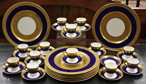 Mintons demitasse and Lenox plates: (lot of 31) Assembled set of porcelain having associated patterns of cobalt blue banding and gilt accents, comprising 13 Mintons demitasse cups with 14 saucers, and 8 Lenox service plates
