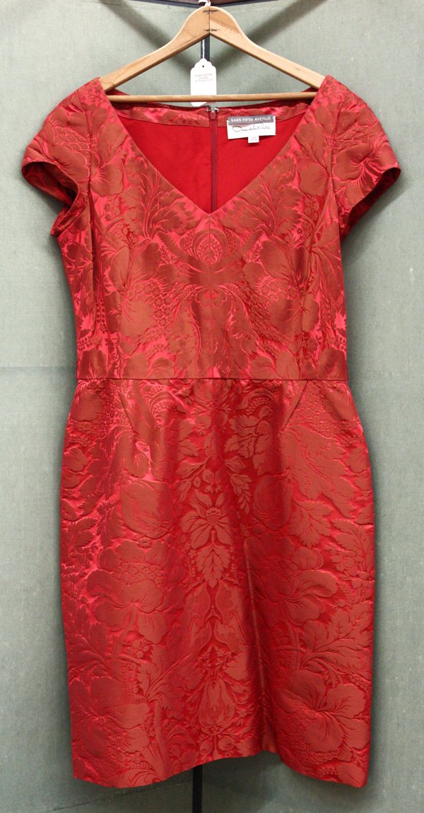 Escada Couture, Oscar de la Renta dresses: (lot of 2) Escada Couture black silk floor-length evening dress, having ribbon lined boatneck, ribbon with six decorative rhinestone buttons running vertically along left side leading to side slit to