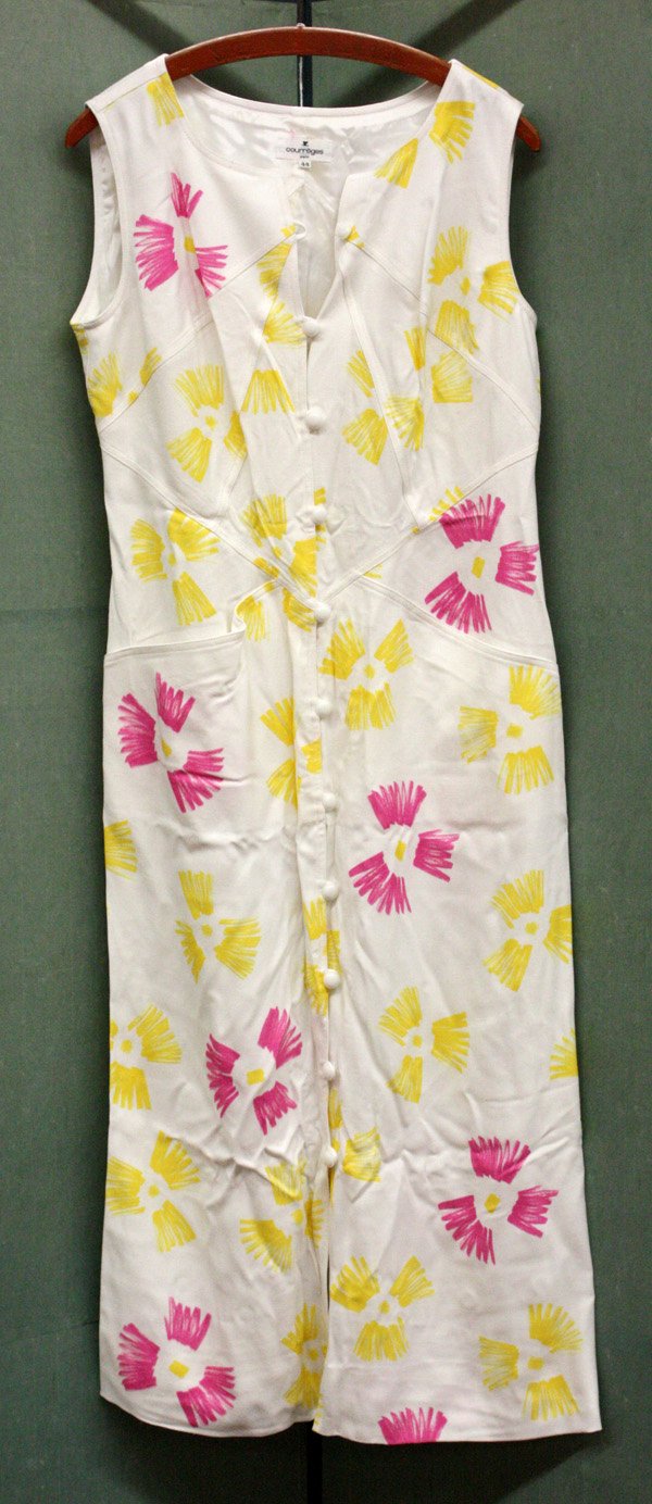 Women's designer clothing: (lot of 5) Grouping of women's designer clothing including an Escada violet flat skirt with small back slit, retaining original tags (unworn) size 44; an Ellen Tracy pink ankle length button down skir