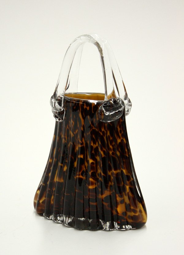 Art Glass Vase, tortoiseshell, purse form: Tortoiseshell art glass vessel having clear double handles, triangular tote form, 9''