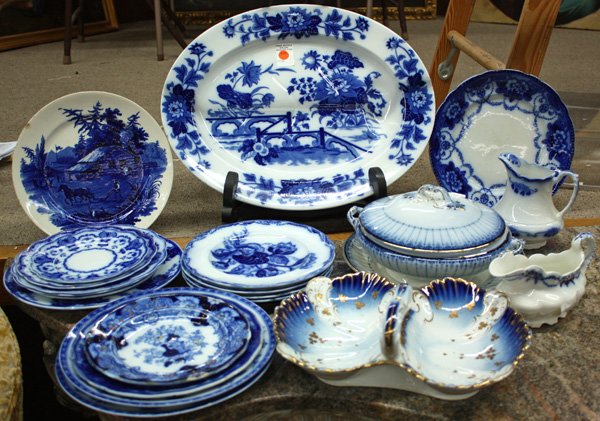 Flow Blue Ceramic Tableware: (lot of 21) Assembled flow blue ceramic tableware including pieces by T. Furnival, Johnson Brothers and W.H. Grindley, comprising ceramic salad plates, service plates, dessert plates, oval serving pla