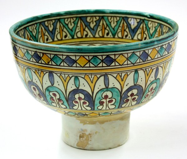 Moroccan faience pottery footed bowl: Moroccan faience pottery footed bowl with polychrome decoration, 9''d