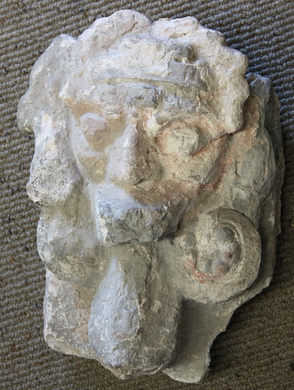 Pre-Columbiain fragment: Mayan stucco fragment with a relief mask. 13.5 H x 11.5 W. 600 - 900 A.D. Some typical losses. Denver Art Museum Deaccession.