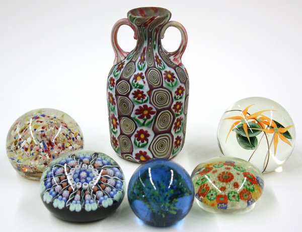 Art glass paperweights: (lot of 6) Art glass paperweights including an Orient & Flume floral motif, and mille fleur designs; together with a mille fleur decorated double handled vase, 6''