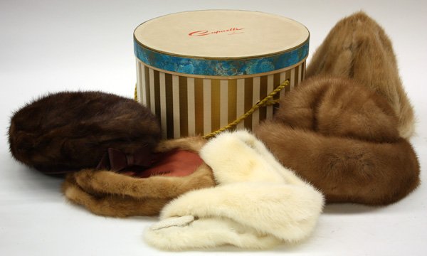 Vintage fur clothing articles: (lot of 5) Group of Vintage fur clothing articles and hat box including a tan rabbit hat, together with a mink fur hat having label Roos/Atkins and a mink fur hat having label Deborah Exclusive
