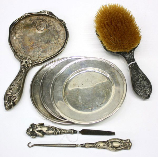 Watrous sterling silver dresser set: (lot of 7) Watrous sterling silver dresser set including brush, hand mirror, file and button hook, together with 3 Wallace sterling bread plates