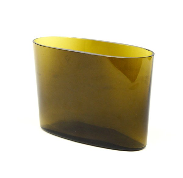 Tapio Wirkkala 'Ovalis' vase: Tapio Wirkkala (Finnish 1915-1985) 'Ovalis' vase, elliptical in form, transparent olive glass, 5.5''h x 7.75''w. Denver Art Museum Deaccession.