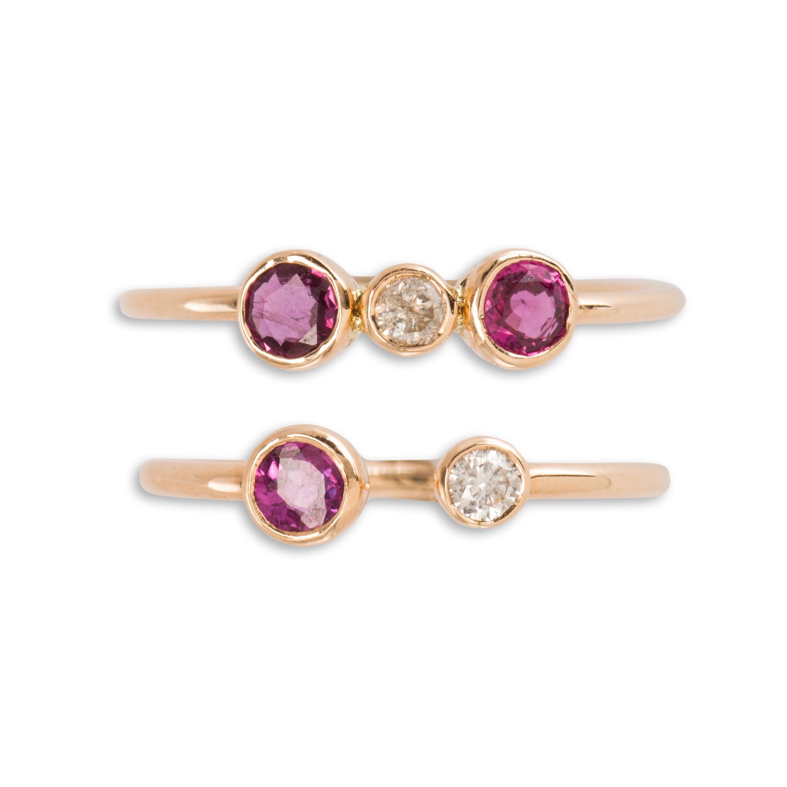 A pair of ruby, diamond and rose gold stacking rings (1 of 2)