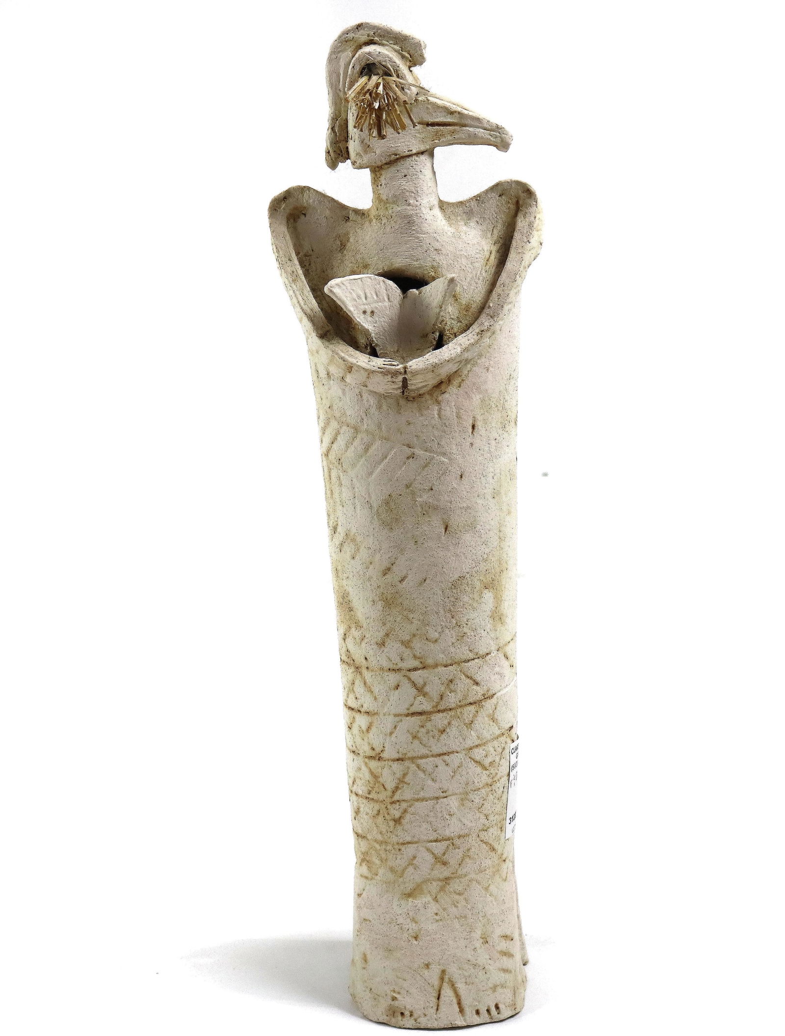 A clay figural sculpture (1 of 3)